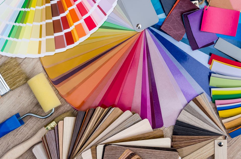Paint sample swatches in a variety of bright colors